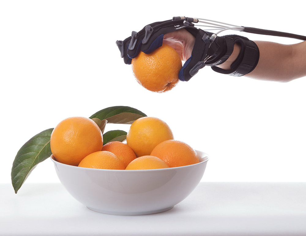 Gloreha Orange und Hand